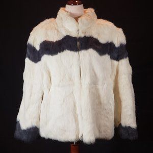 Vintage white rabbit fur zippered jacket with black trim.  Fully lined. Size 18